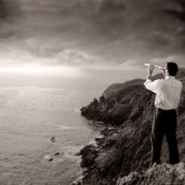 Businessman with telescope