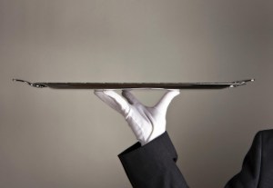 Customer service - white gloves and tray